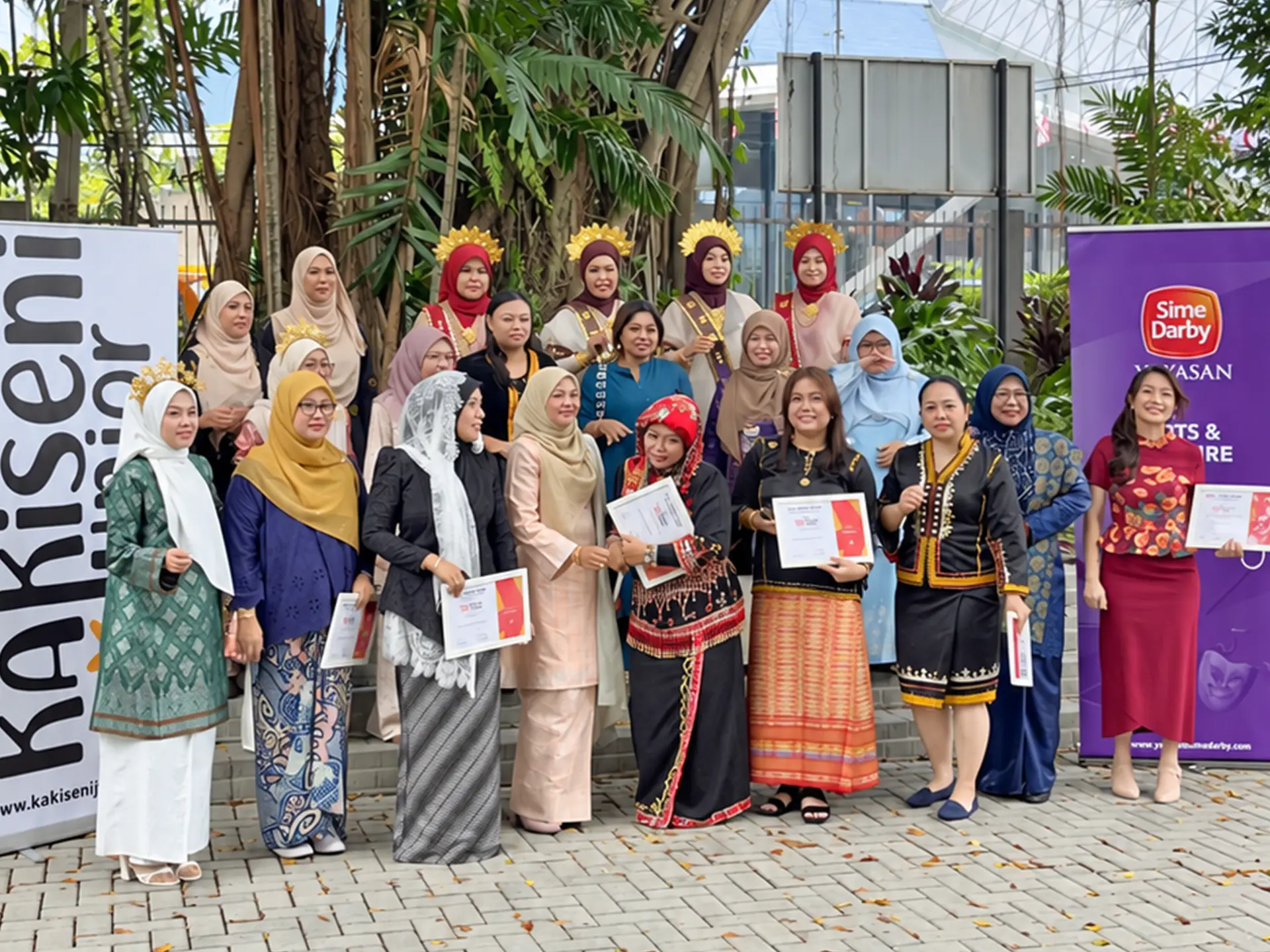 Arts programme participants gathered for a group photograph